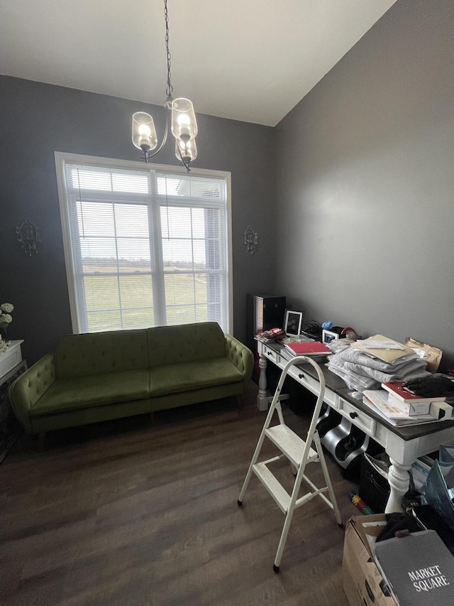 home office featuring a notable chandelier and dark hardwood / wood-style floors