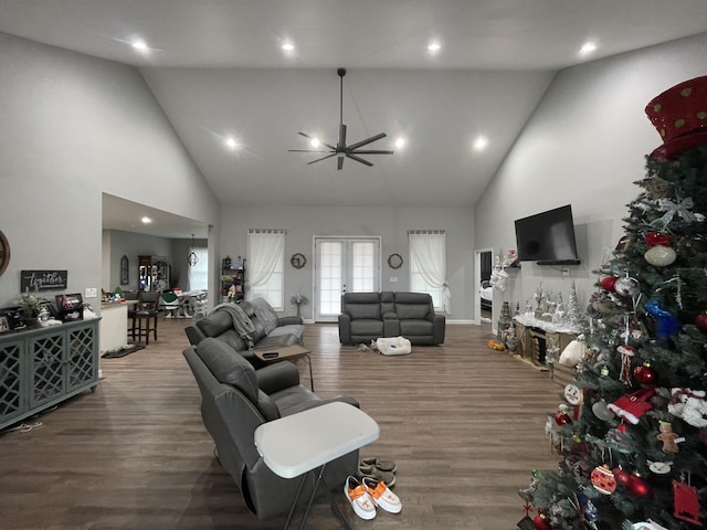 living room featuring high vaulted ceiling, wood finished floors, recessed lighting, french doors, and ceiling fan