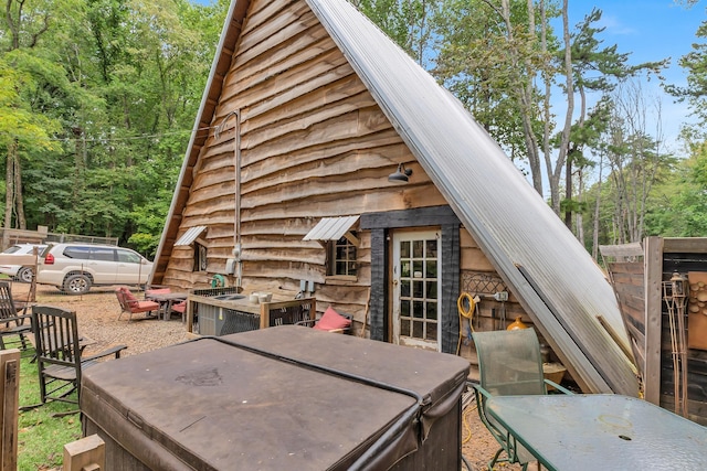 view of patio with a hot tub