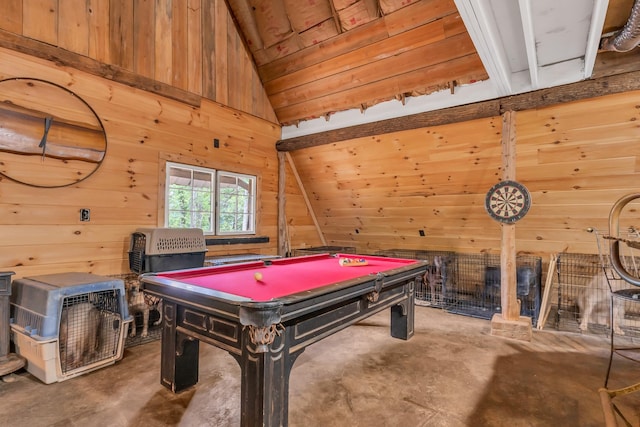 recreation room featuring concrete flooring, vaulted ceiling, wooden walls, and pool table