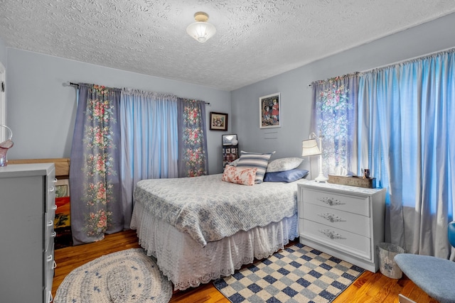 3004 Vine St, White Pine, TN 37890 - bedroom with light wood finished floors and a textured ceiling