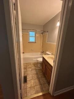 full bathroom with toilet, shower / tub combination, and vanity