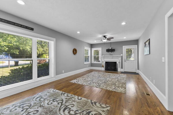 1211 W 6th N St, Morristown, TN 37814 - living area featuring a ceiling fan, a fireplace, recessed lighting, and wood finished floors
