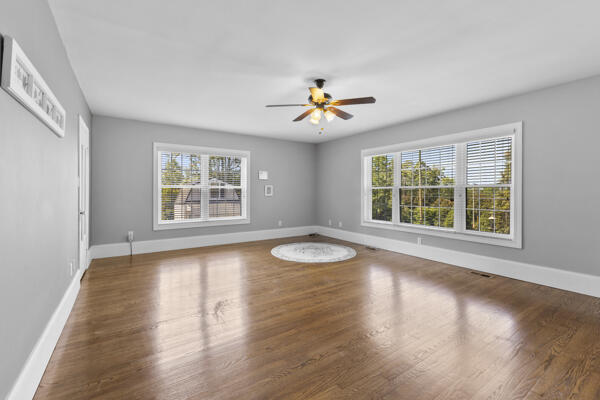 1211 W 6th N St, Morristown, TN 37814 - empty room with a ceiling fan and wood finished floors