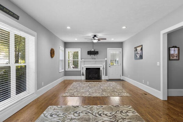 1211 W 6th N St, Morristown, TN 37814 - living area featuring ceiling fan, a fireplace, recessed lighting, and wood finished floors