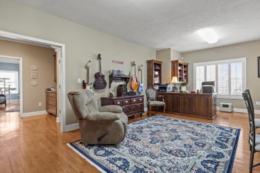 office space featuring wood finished floors and baseboards