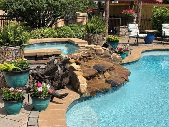 2657 Lakemoore Dr, Morristown, TN 37814 - view of swimming pool featuring an in-ground hot tub, fence, and a patio area