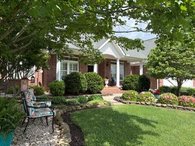 2657 Lakemoore Dr, Morristown, TN 37814 - obstructed view of property with a front lawn and brick siding