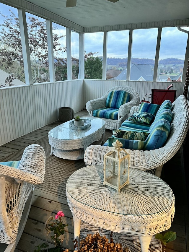 sunroom with a mountain view