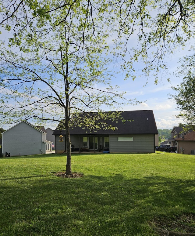 9360 Gabrielle Rd, Strawberry Plains, TN 37871 - back of property with a lawn