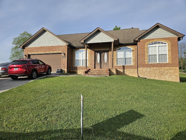 9360 Gabrielle Rd, Strawberry Plains, TN 37871 - single story home featuring an attached garage, a shingled roof, and a front lawn