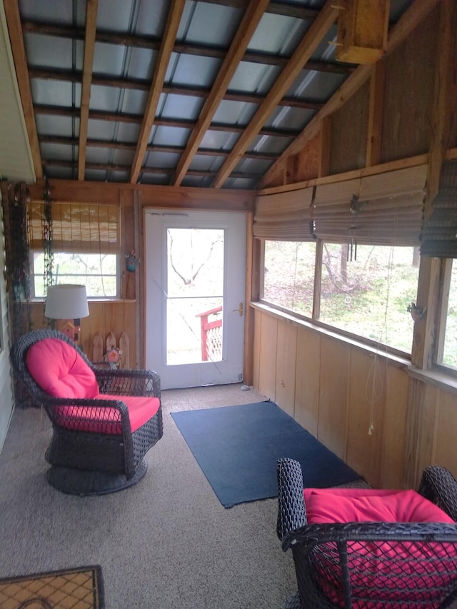 sunroom with lofted ceiling