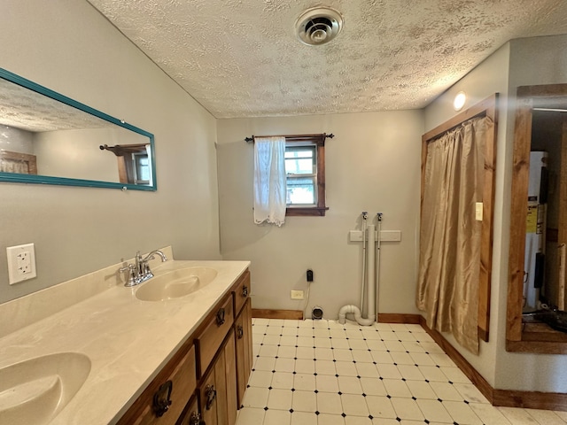 4140 Chavis Rd, Cosby, TN 37722 - full bathroom featuring a textured ceiling, double vanity, tile patterned floors, and a shower with curtain