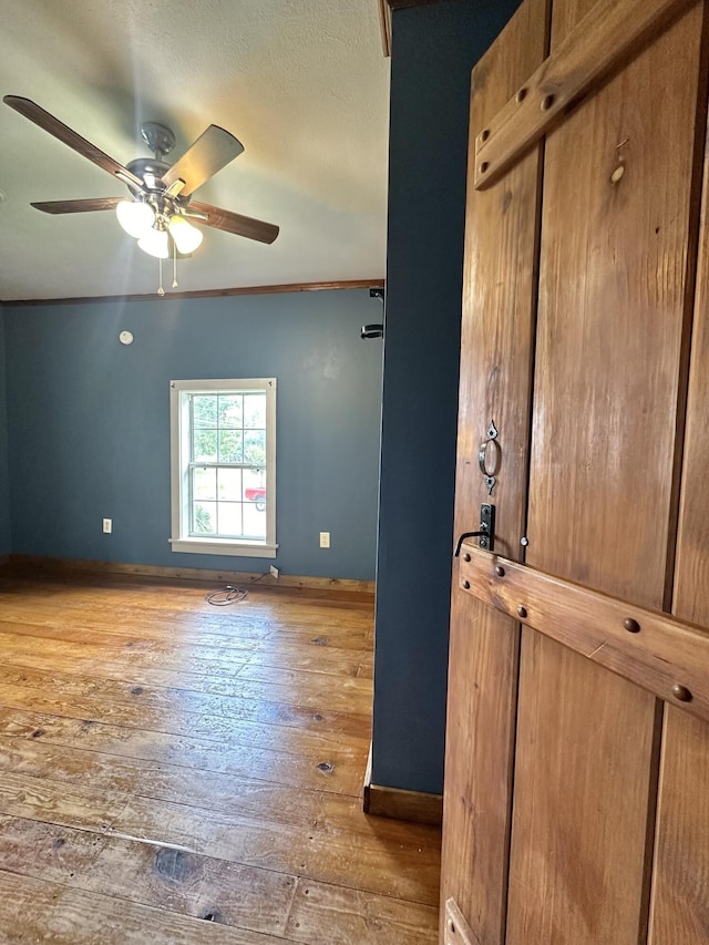 4140 Chavis Rd, Cosby, TN 37722 - spare room with hardwood / wood-style floors and a ceiling fan
