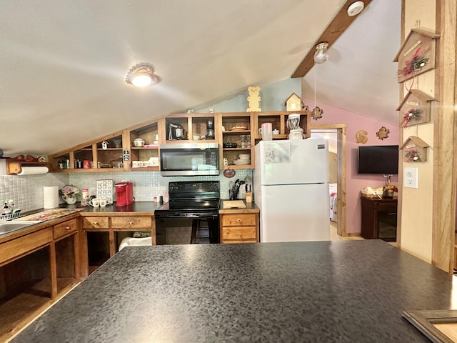 4140 Chavis Rd, Cosby, TN 37722 - kitchen with stainless steel microwave, black range with electric stovetop, freestanding refrigerator, open shelves, and tasteful backsplash
