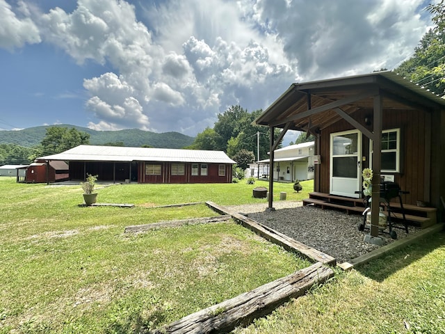 4140 Chavis Rd, Cosby, TN 37722 - view of green lawn featuring entry steps and a mountain view