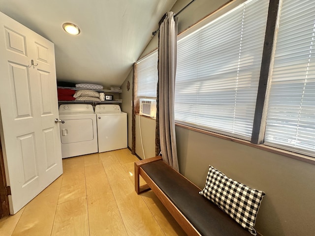 4140 Chavis Rd, Cosby, TN 37722 - laundry area with washer and clothes dryer, cooling unit, and light wood-style flooring