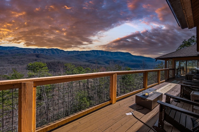 449 Lucerne Way, Gatlinburg, TN 37738 - wooden deck with a mountain view and a fire pit