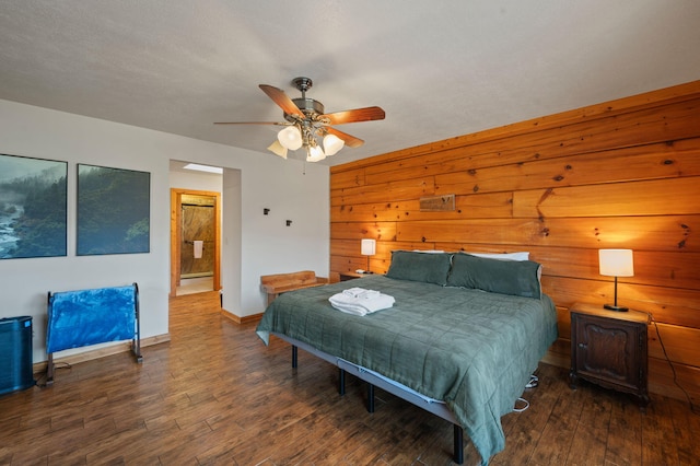 449 Lucerne Way, Gatlinburg, TN 37738 - bedroom featuring hardwood / wood-style floors, ensuite bath, baseboards, and ceiling fan