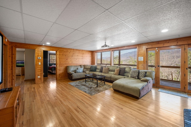 449 Lucerne Way, Gatlinburg, TN 37738 - living room with wooden walls, a drop ceiling, and light wood finished floors