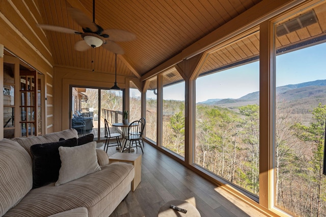 449 Lucerne Way, Gatlinburg, TN 37738 - sunroom with a wealth of natural light, a mountain view, wood ceiling, and a ceiling fan