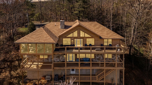 449 Lucerne Way, Gatlinburg, TN 37738 - back of property with a deck, roof with shingles, a wooded view, and a chimney