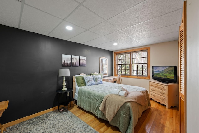 449 Lucerne Way, Gatlinburg, TN 37738 - bedroom with recessed lighting, a paneled ceiling, baseboards, and wood finished floors