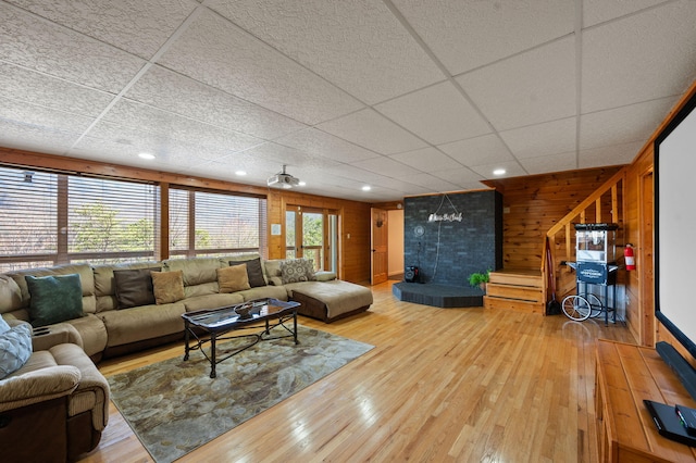 449 Lucerne Way, Gatlinburg, TN 37738 - living area featuring wood walls, a paneled ceiling, and hardwood / wood-style floors