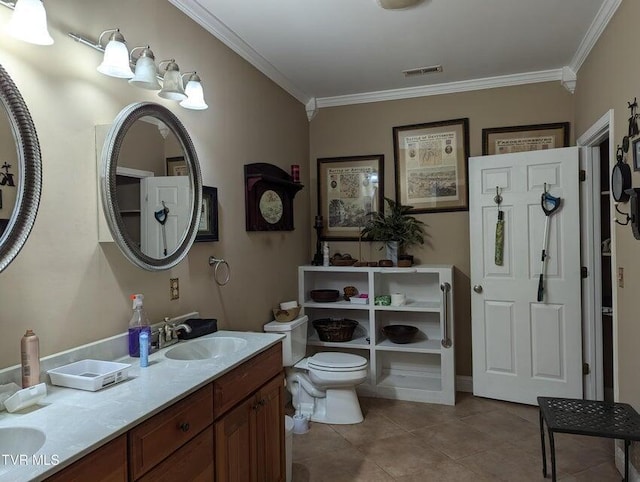 bathroom with tile patterned flooring, vanity, toilet, and crown molding