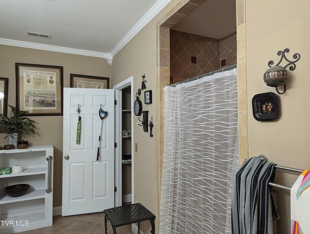 bathroom with tile patterned floors, crown molding, and a shower with shower curtain