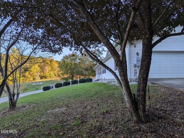 view of yard with a garage