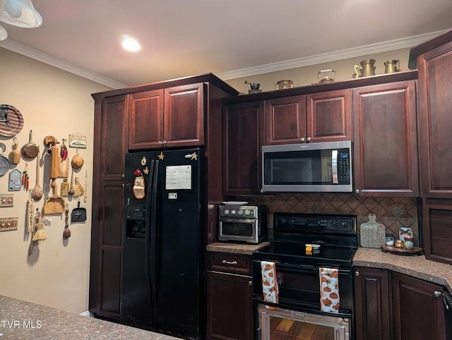 kitchen with decorative backsplash, crown molding, and black appliances