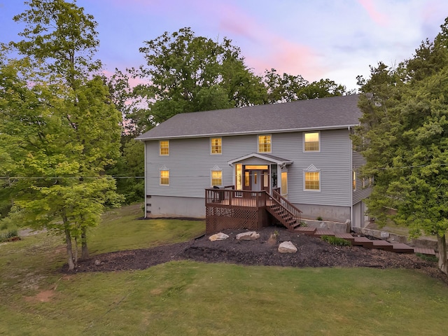 6525 Idumea Rd, Corryton, TN 37721 - back of property at dusk with a lawn and a deck