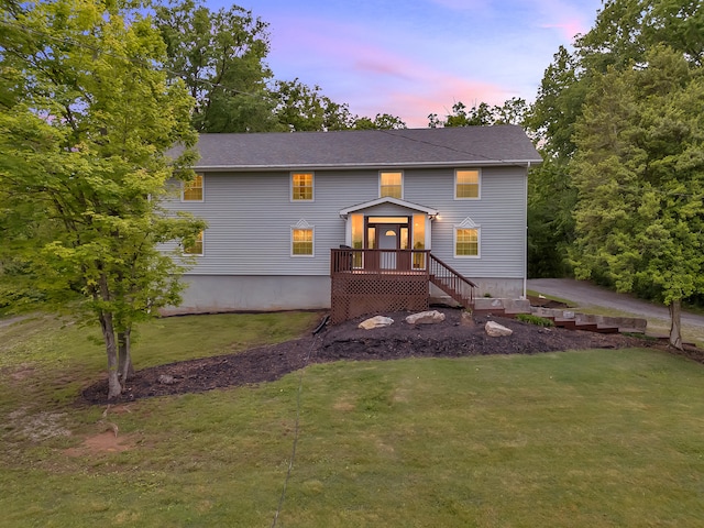 6525 Idumea Rd, Corryton, TN 37721 - back of property at dusk featuring a yard
