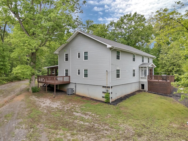 6525 Idumea Rd, Corryton, TN 37721 - back of property featuring a wooden deck, a yard, and view of scattered trees