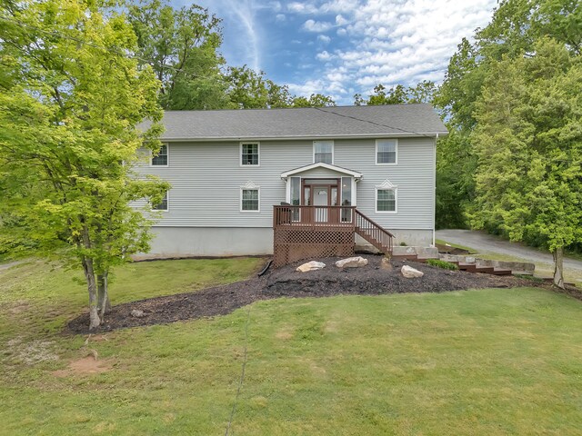 6525 Idumea Rd, Corryton, TN 37721 - back of house featuring a lawn and a deck