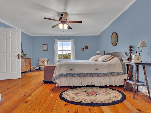 6525 Idumea Rd, Corryton, TN 37721 - bedroom with hardwood / wood-style flooring, ornamental molding, and a ceiling fan
