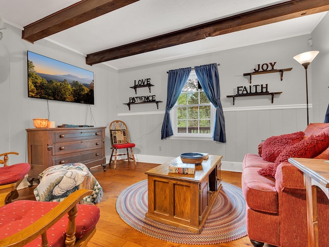 6525 Idumea Rd, Corryton, TN 37721 - living area featuring wood finished floors, beam ceiling, wainscoting, and crown molding