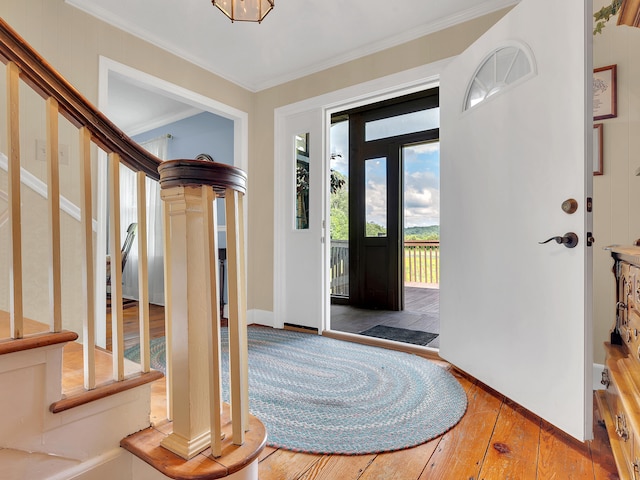 6525 Idumea Rd, Corryton, TN 37721 - entrance foyer featuring stairs, hardwood / wood-style flooring, and crown molding
