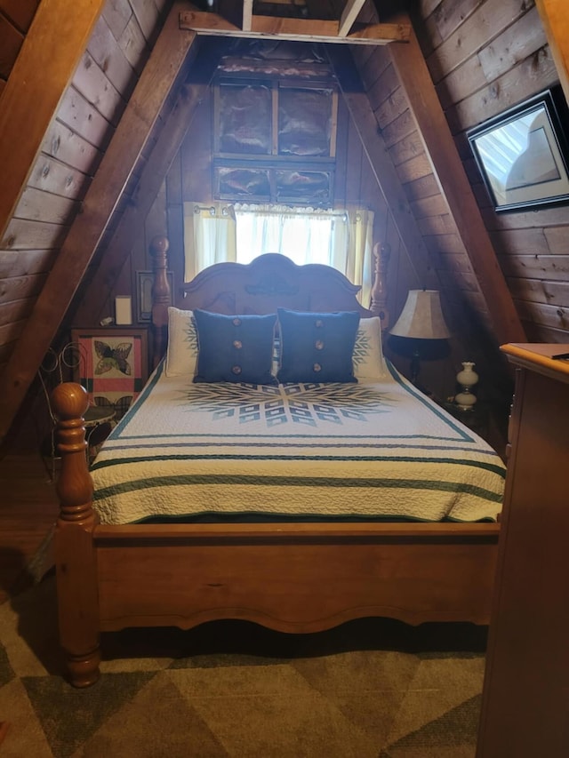 bedroom with vaulted ceiling with beams and wood ceiling