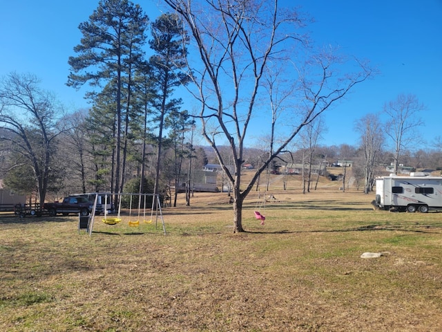 view of yard with a playground