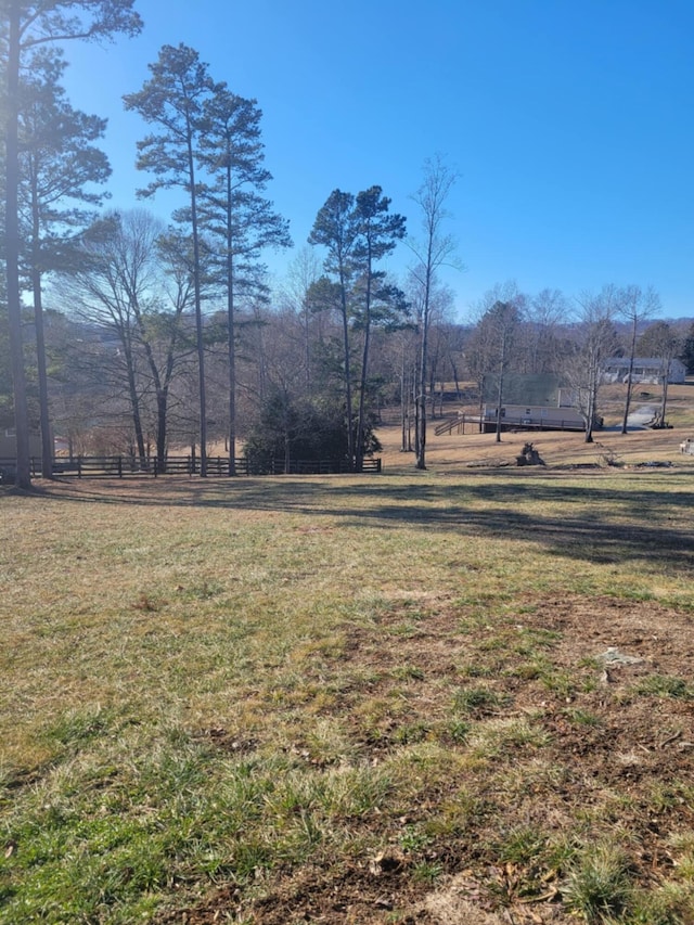 view of yard with a rural view