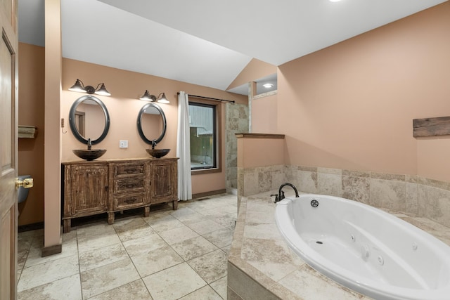 2935 Glendale Community Rd, Greenback, TN 37742 - full bath with a jetted tub, double vanity, vaulted ceiling, and a shower