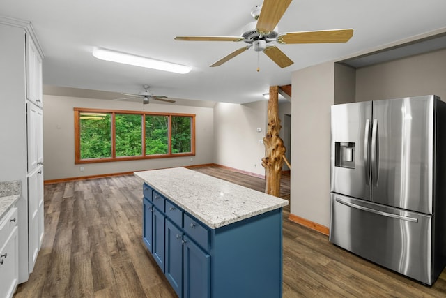 2935 Glendale Community Rd, Greenback, TN 37742 - kitchen featuring stainless steel fridge, blue cabinets, ceiling fan, white cabinetry, and dark wood-style floors