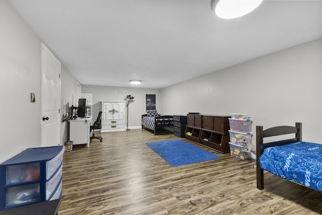 bedroom featuring wood-type flooring