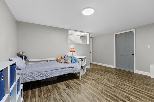 bedroom featuring hardwood / wood-style flooring