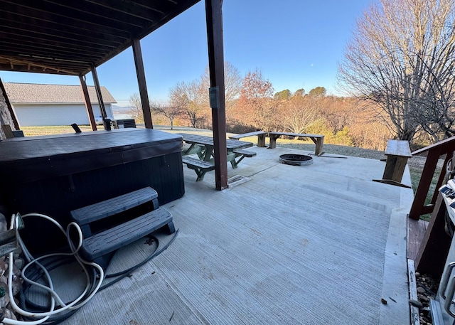 deck featuring a hot tub