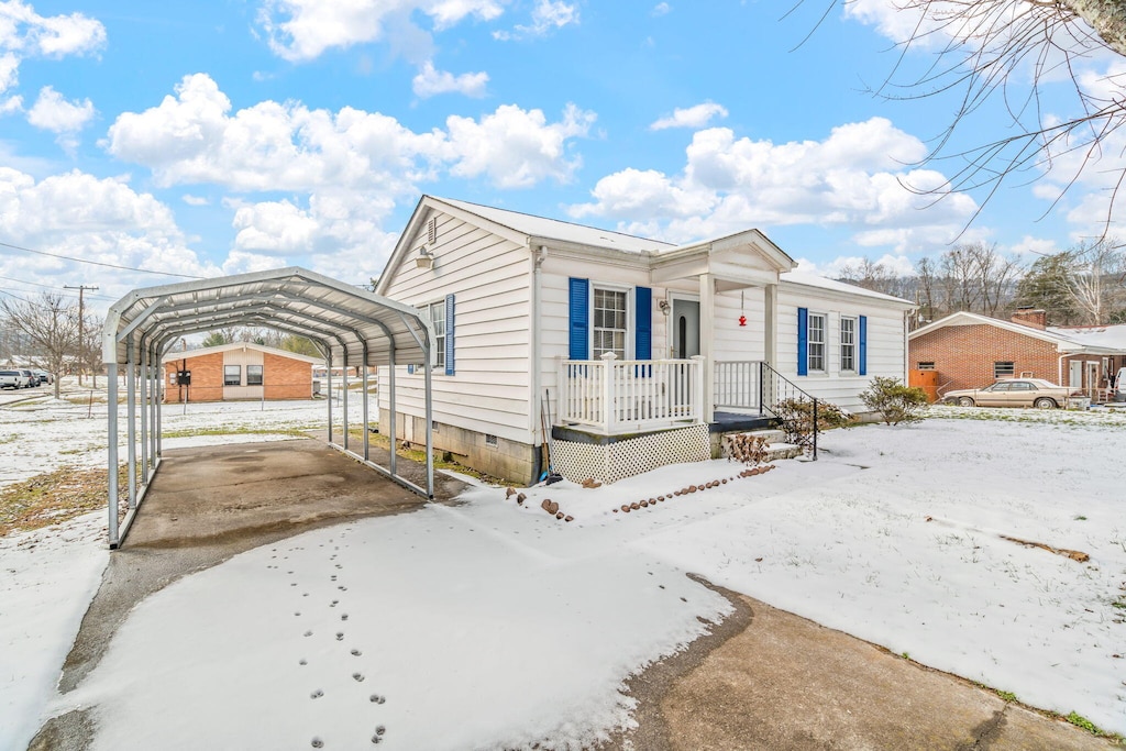 view of front of house featuring a carport