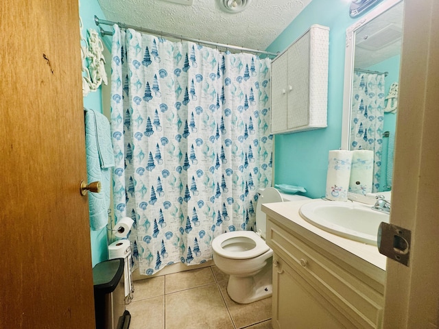 full bath featuring vanity, toilet, a textured ceiling, tile patterned floors, and a shower with curtain