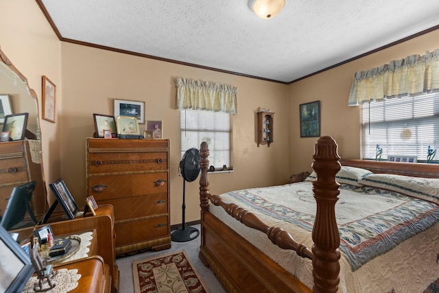 bedroom with light colored carpet and a textured ceiling